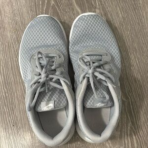 Nike, tennis shoes in light blue. Very comfortable